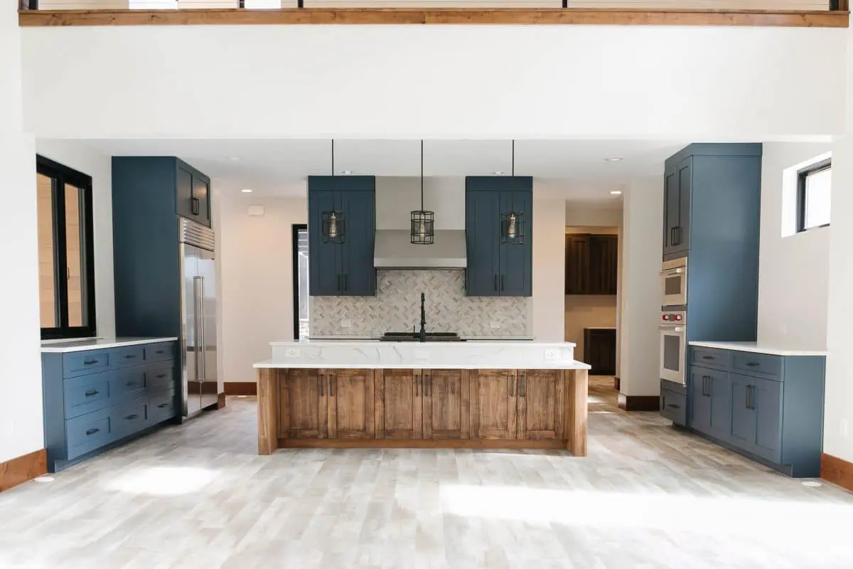 Mountain Modern Custom Colorado Home with Blue and Wood Cabinetry | Gowler Homes